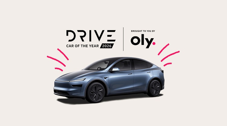 Tesla with Drive Car of The Year 2026 logo and Oly logo.
