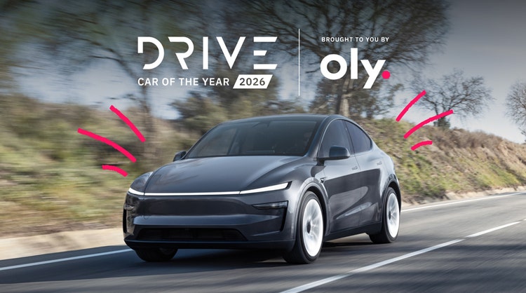 Tesla with Drive Car of The Year 2026 logo and Oly logo.