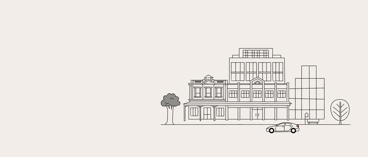 illustration of a car in front of a row of buildings