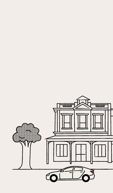 illustration of a car in front of a row of buildings